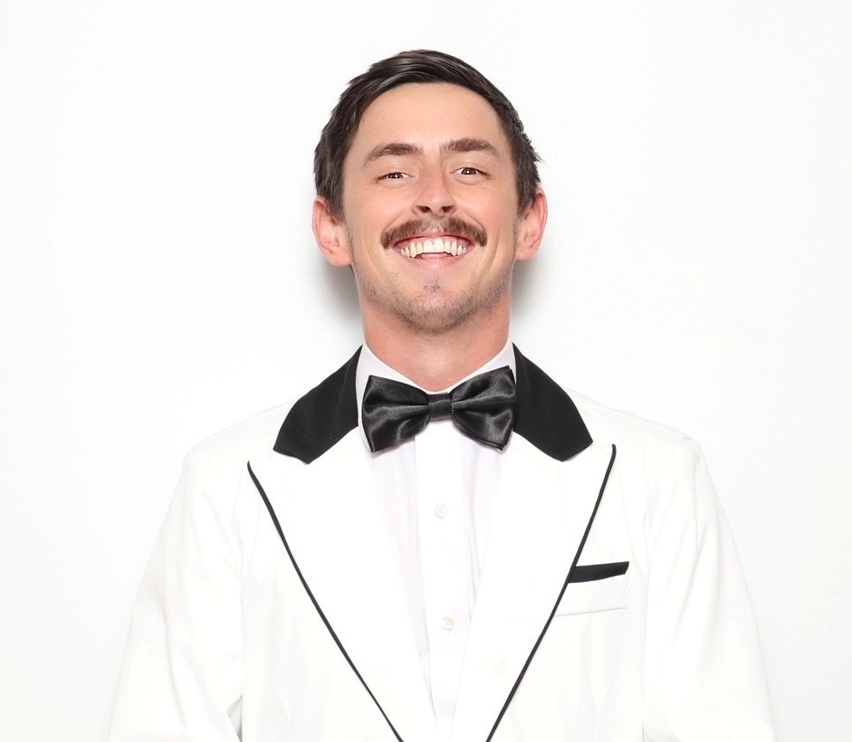 Headshot of Drake Warren